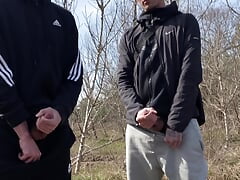 TWO GUYS JERK OFF OUTDOORS